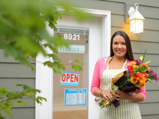 bigstock Florist in front of shop with 24830192