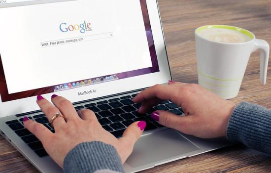 : A woman using Google search