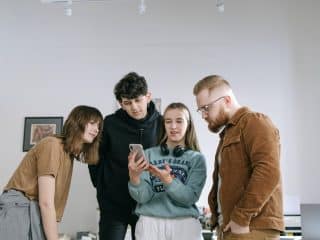 Family Looking at smart phone