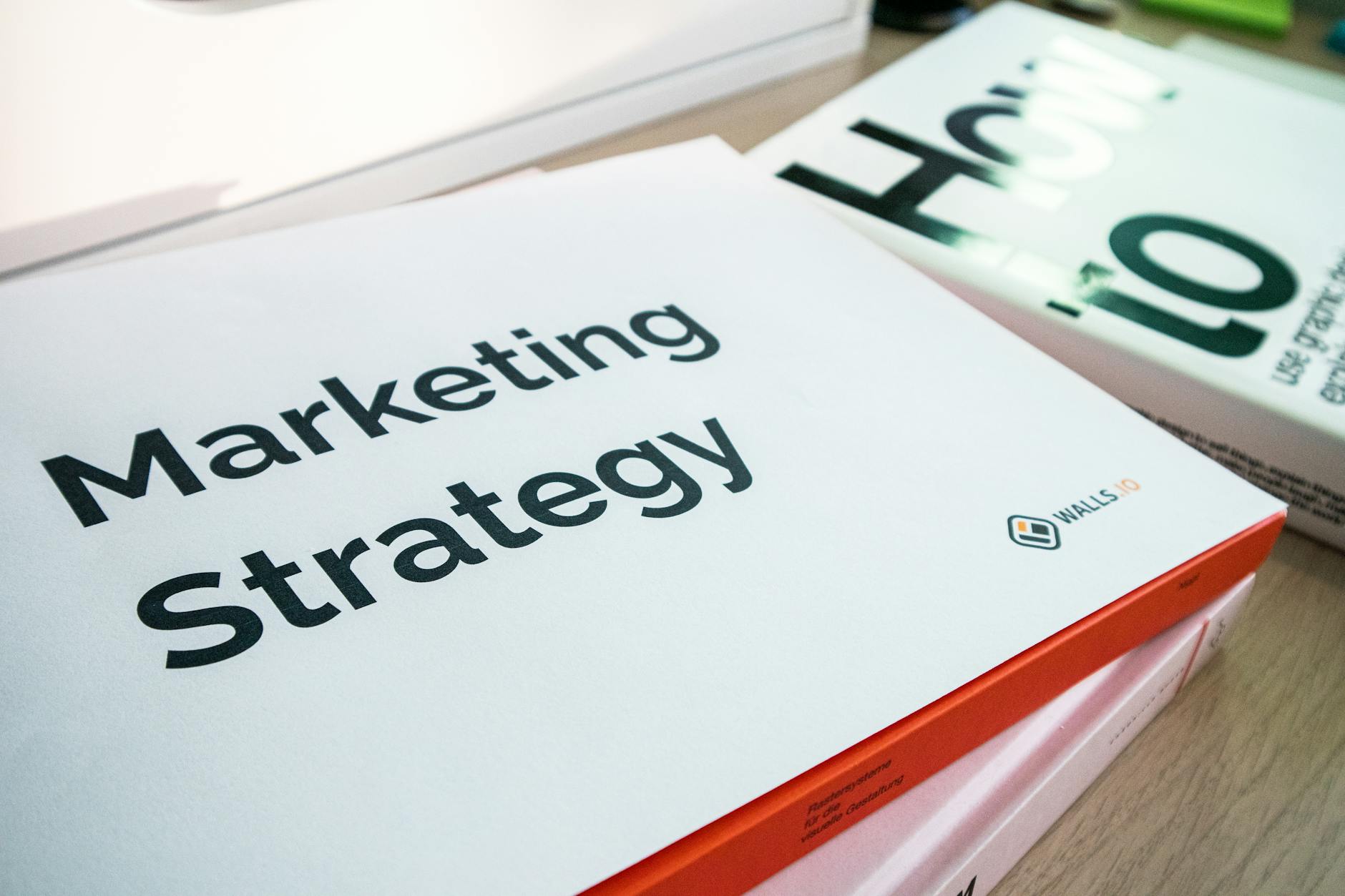 Marketing materials for local businesses in a pile - Catdi Houston printing company